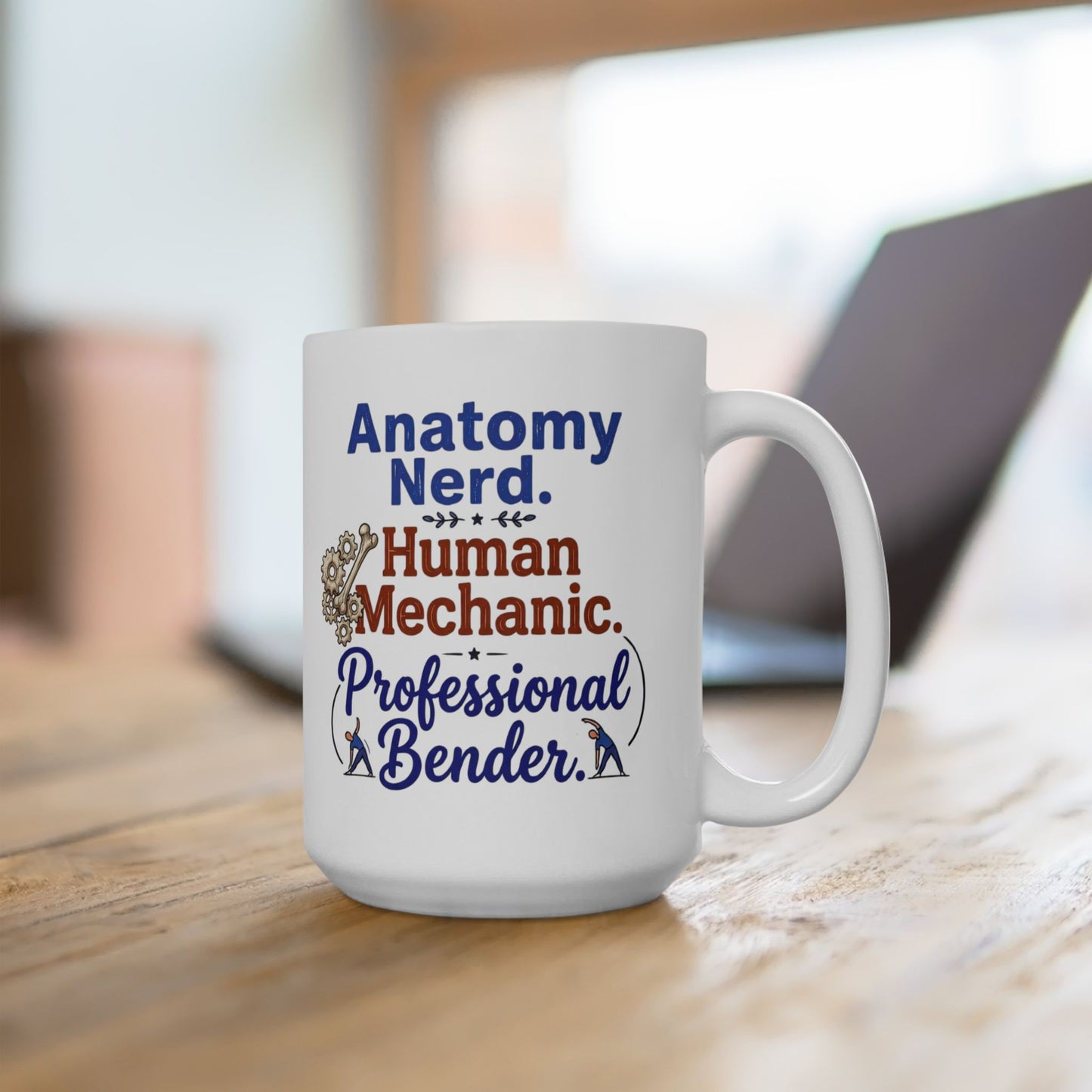 White mug with text 'Anatomy Nerd, Human Mechanic, Professional Bender' on a wooden surface.