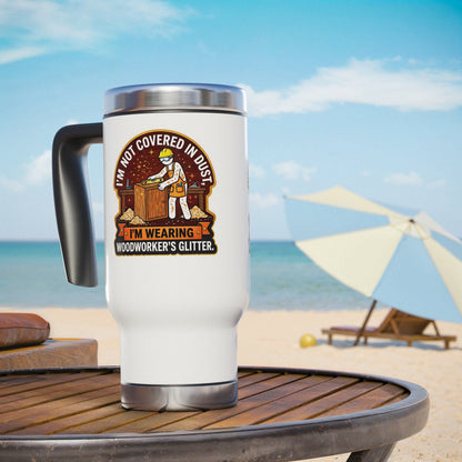 White travel mug with a graphic design on a beach table with ocean and umbrella in the background