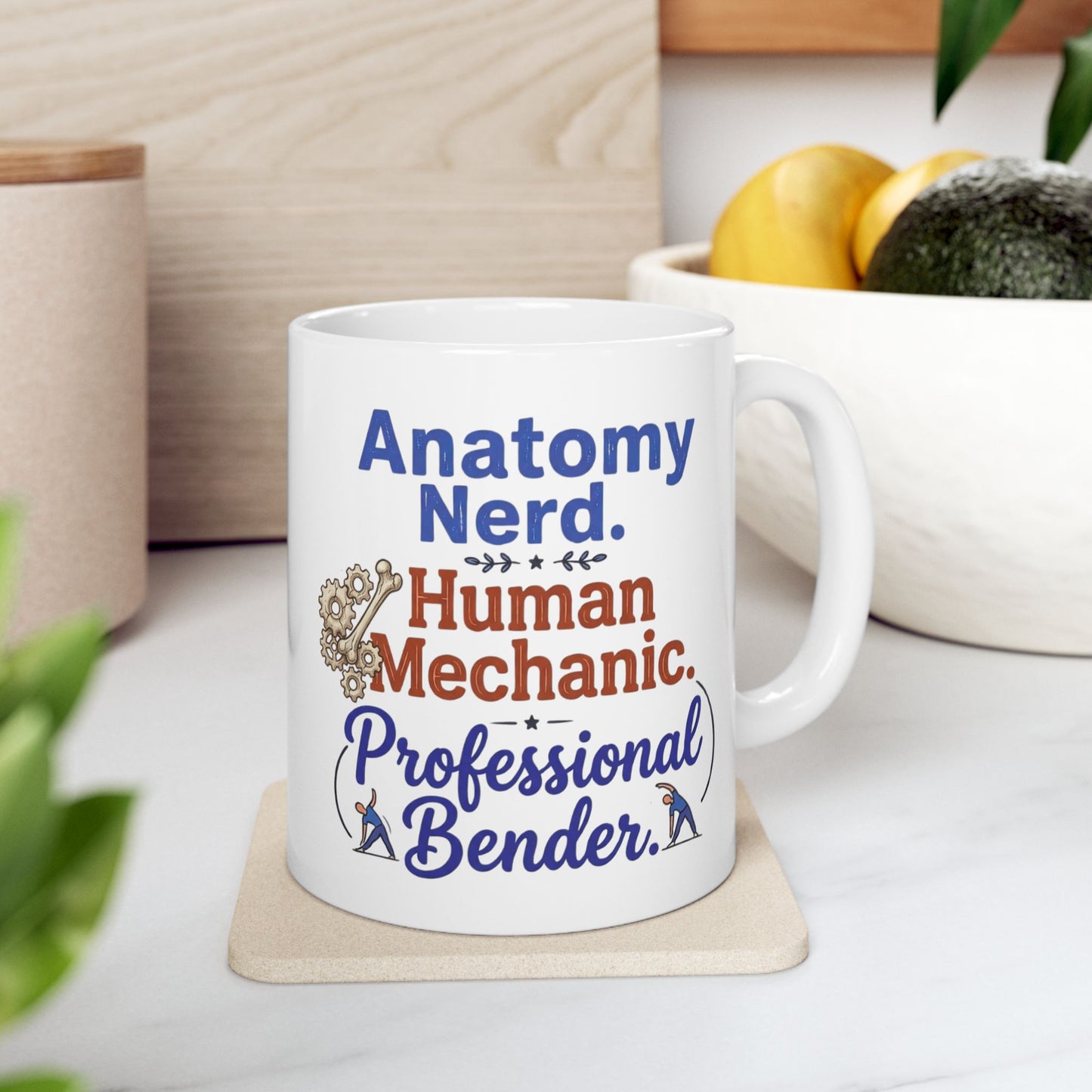 White mug with text 'Anatomy Nerd, Human Mechanic, Professional Bender' on a wooden coaster.